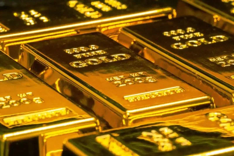 Gold bars in a vault, representing DBS Bank's tokenized physical gold for retail investors
