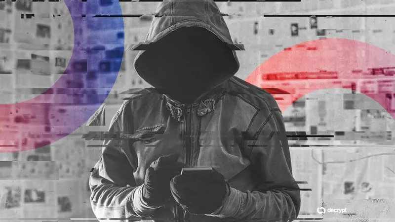 Illustration of a hooded figure at a laptop representing a cryptocurrency wallet exploit