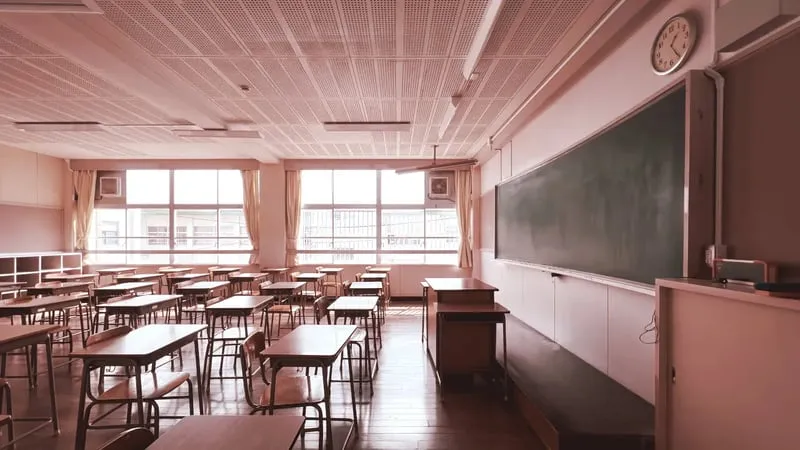 A classroom of students at desks, representing education financing